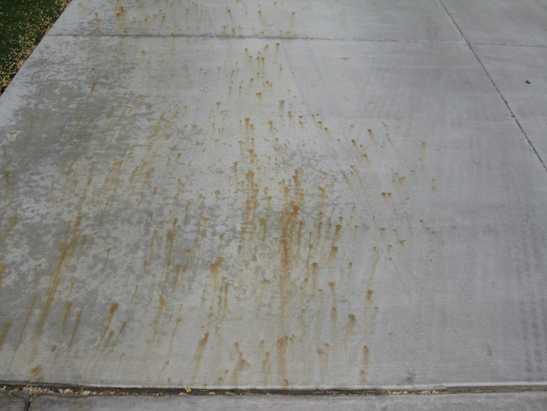 fertilizer stain removal on concrete
