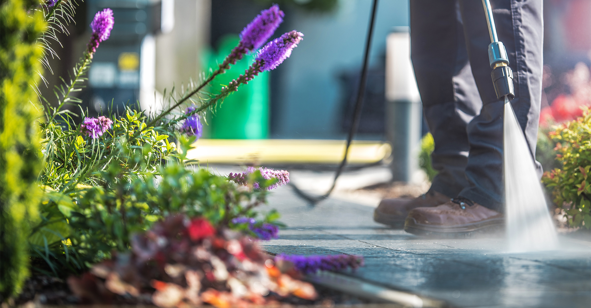 pressure washing the sidewalk